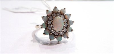 Lot 16 - An opal cluster ring