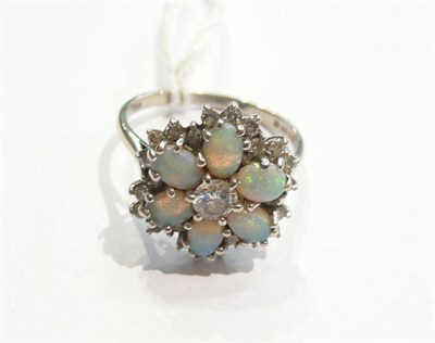 Lot 27 - An opal and diamond cluster ring