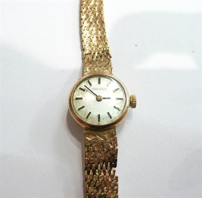 Lot 34 - A 9ct gold lady's Tissot wristwatch