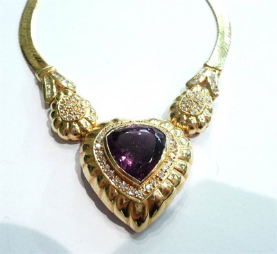 Lot 68 - A yellow metal and amethyst necklace set with diamonds, stamped '750', complete with photocopy...