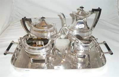 Lot 76 - A silver four piece tea service, a pair of sugar tongs and plated twin handled tray, 55oz weighable