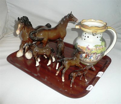 Lot 77 - A Burleigh ware puzzle jug and six Beswick horses
