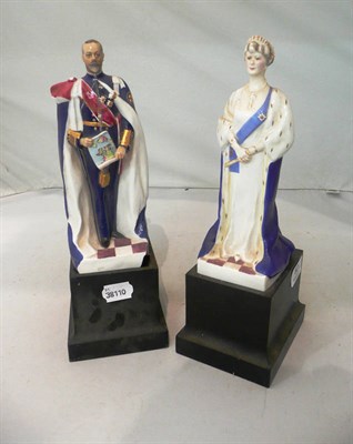 Lot 82 - Pair of Royal Worcester figures of King George V and Queen Mary, with wood stands (a.f)