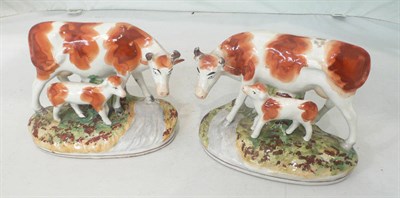 Lot 88 - Pair of Staffordshire cow and calf groups