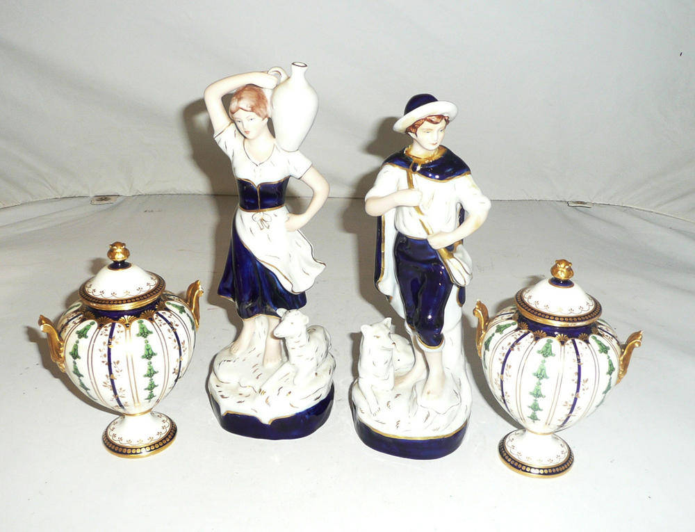 Lot 91 - A pair of Royal Crown Derby small vases and covers, a pair of Royal Dux figures