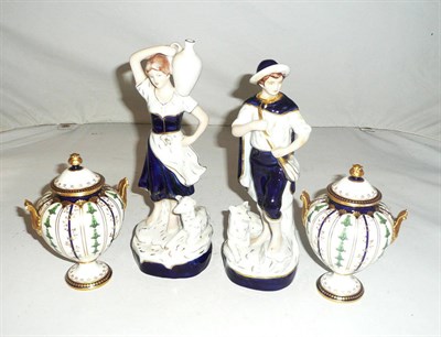 Lot 91 - A pair of Royal Crown Derby small vases and covers, a pair of Royal Dux figures