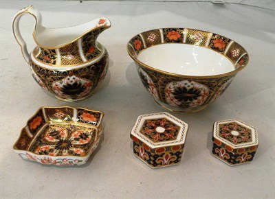 Lot 93 - A Royal Crown Derby Imari pattern milk jug and sugar basin, small dish and two trinket boxes