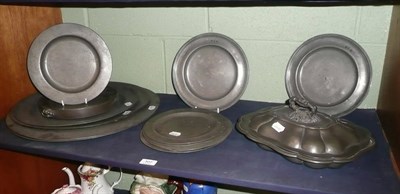 Lot 107 - Four early 18th century large pewter chargers, six smaller plates, a warming dish and a tureen...