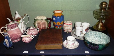 Lot 108 - A silver cigarette case, a leather photograph album, an oil lamp, a Beswick character jug, Old...