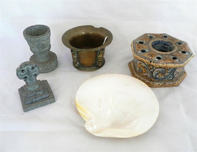 Lot 116 - Bronze mortar, majolica inkwell, mother of pearl shell dish and a grey stone mortar and cross