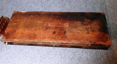Lot 140 - A leather clad double shotgun case