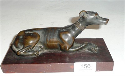 Lot 156 - A 19th century bronze model of a dog on a rouge marble base