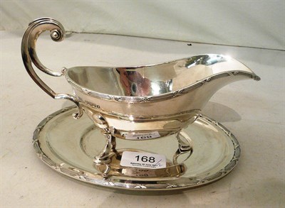Lot 168 - Viners of Sheffield silver sauce boat and stand