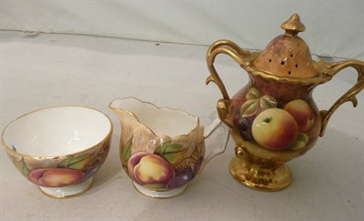 Lot 171 - A Coalport fruit painted vase and cover and an Aynsley Orchard Gold cream and sugar (3)