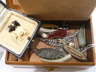 Lot 249 - A 9ct gold bracelet, 9ct gold cross, half dollar pendant, silver bangle etc