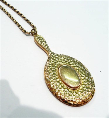 Lot 257 - A 9ct gold mirror on a belcher chain