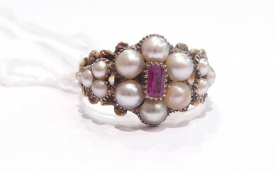 Lot 265 - A ruby and half pearl mourning ring