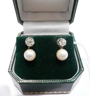 Lot 274 - A pair of diamond and cultured pearl stud earrings