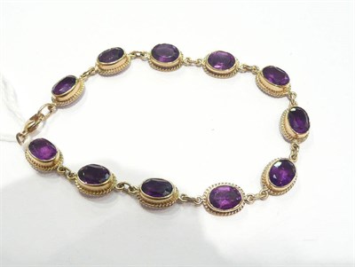 Lot 279 - A 9ct gold amethyst bracelet