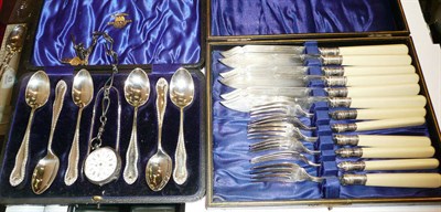 Lot 285 - A Continental fob watch and silver watch chain and two cased sets of plated flatware