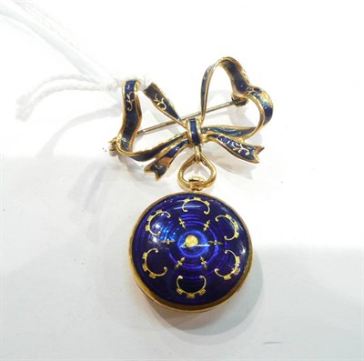 Lot 288 - An 18ct gold enamelled locket on bow brooch