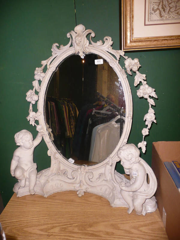Lot 800 - A plaster and painted cupid mounted dressing table mirror, 19th century (a.f.)