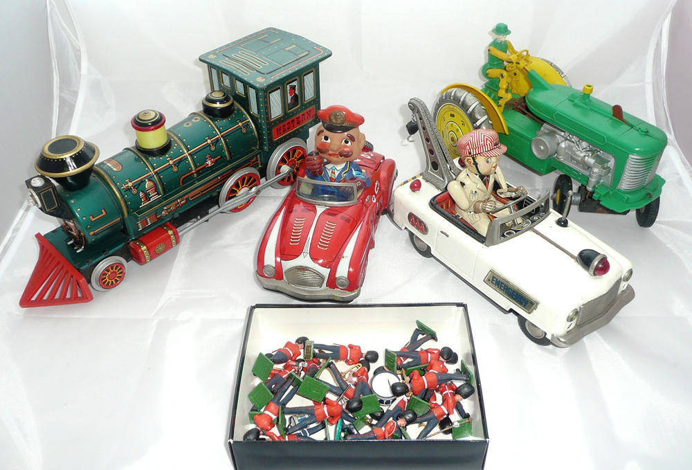 Lot 1118 - Three Japanese Battery Operated Tinplate Toys - Marusan 'Smoky Joe', 'AAA Emergency' breakdown...