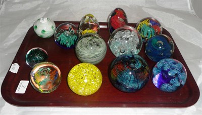 Lot 2 - A collection of glass paperweights