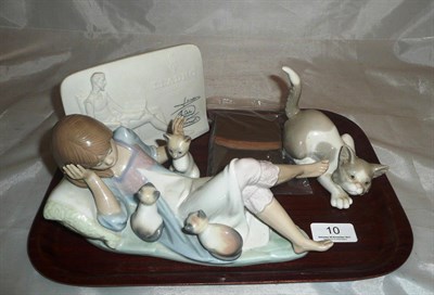 Lot 10 - Lladro figure of a reclining girl with three cats, Lladro cat, Lladro Collectors Society bisque...