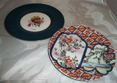 Lot 24 - Japanese Imari decorated plate and a Royal Worcester floral painted plate (2)