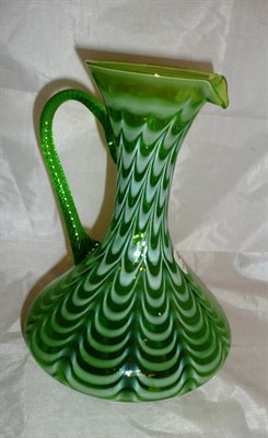 Lot 45 - Nailsea type green glass jug