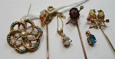 Lot 73 - A turquoise and cultured pearl brooch, three stick pins and two pendants, one on a chain