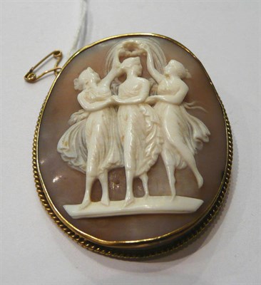 Lot 77 - A cameo brooch depicting the three graces