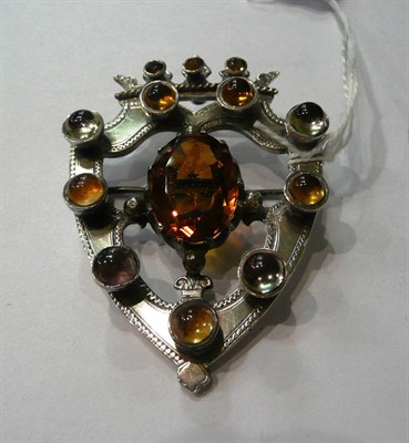 Lot 102 - A Scottish shield shaped quartz set brooch