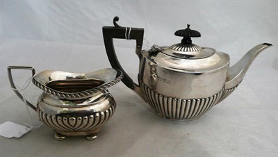 Lot 115 - Silver teapot and milk jug