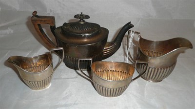 Lot 122 - A matched four piece silver tea set