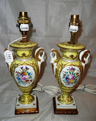 Lot 143 - Pair of Paris porcelain yellow ground vase/lamps