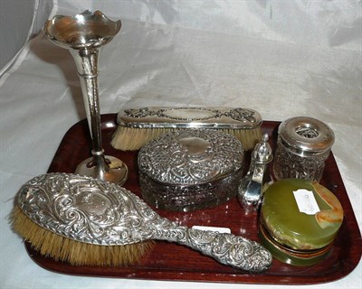 Lot 146 - Silver mounted dressing table items, silver spill vase, hair tidy, pepperette, onyx cased timepiece