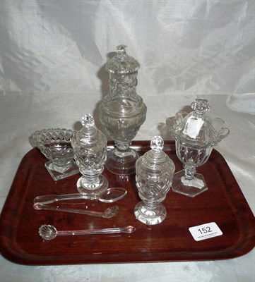 Lot 152 - Four glass mustard pots, salt and three spoons