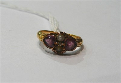 Lot 214 - A Victorian yellow metal ring set with seed pearls and amethyst