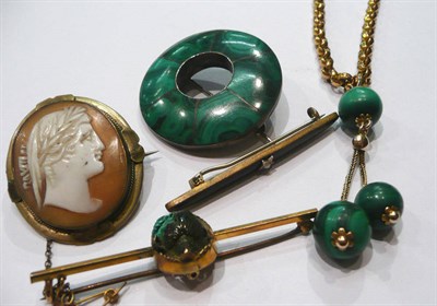 Lot 216 - Cameo brooch, bar brooch with seed pearl inset, a scarab brooch, a malachite brooch and a malachite