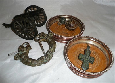 Lot 229 - Quantity of assorted metal wares, including miniature cannon, cross, bottle coasters etc