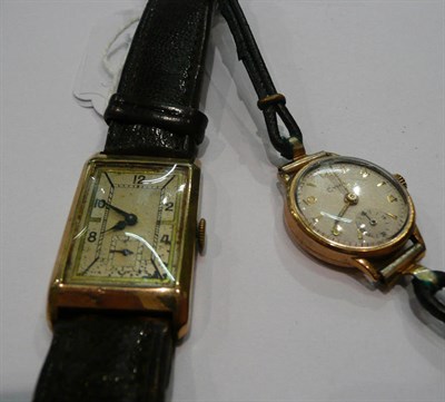 Lot 275 - A rectangular 9ct gold wristwatch and a Cyma 9ct gold lady's watch