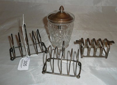 Lot 305 - Three silver toast racks and a preserve jar