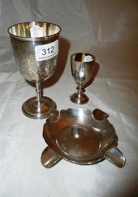 Lot 312 - Silver engraved goblet, silver ashtray and an egg cup