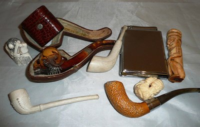 Lot 314 - Meerschaum pipe, two clay pipes, travelling light, netsuke and two bone carvings