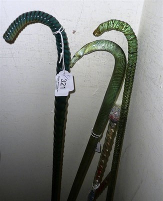 Lot 321 - Five glass walking sticks