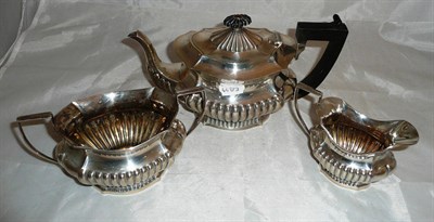 Lot 334 - Silver three piece tea service, 30oz