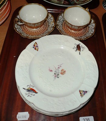 Lot 336 - Two Flight, Barr and Barr cups and saucers and five plates decorated with birds and butterflies