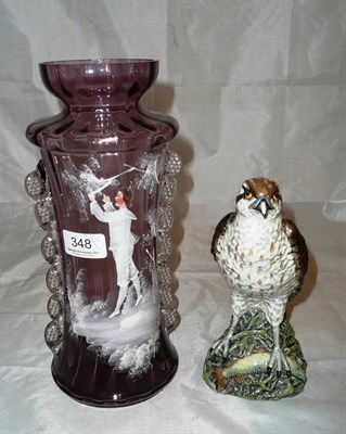 Lot 348 - A Mary Gregory lilac glass vase enamelled with a young boy, and a Beswick Beneagles osprey...